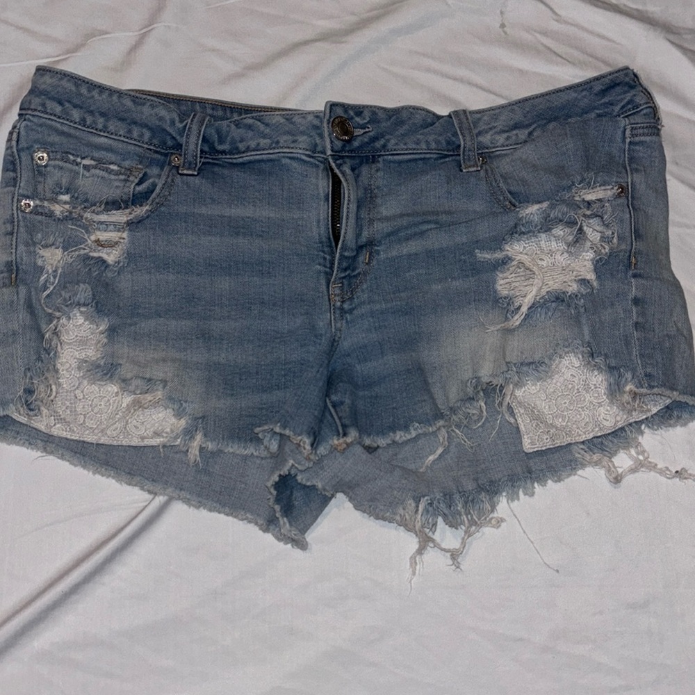 American eagle outfitters super low shortie Jean shorts light blue lace pockets